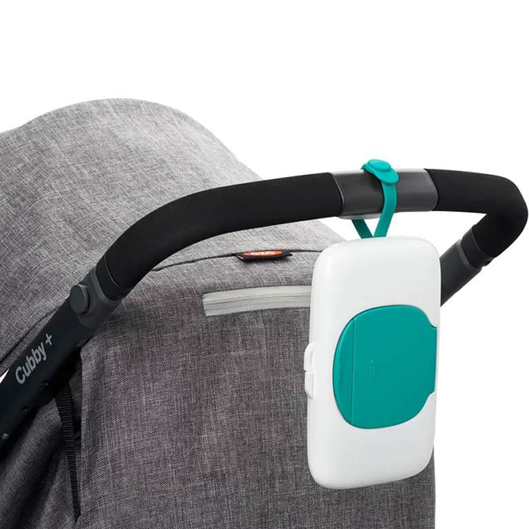 Portable baby wipes dispenser clipped to stroller handle for easy diaper changes on the go